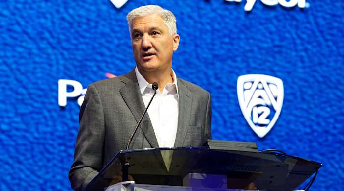 Pac-12 commissioner George Kliavkoff speaks at the NCAA college football Pac-12 media day.